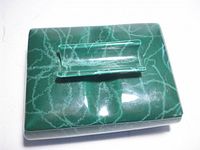 Top view of green marbled ceramic box with lid and handle