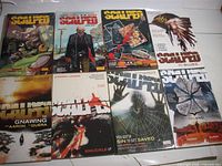 Front covers of eight Scalped Vertigo trade paperbacks laid out in two rows