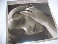 Front view of sealed Taylor Swift 2026 calendar showing cover image and publisher logo