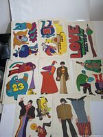 Full set of sticker sheets laid out, showing designs