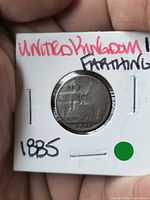 Reverse of 1885 farthing in 2x2 cardboard flip
