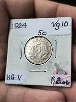 Obverse of 1924 Canada 5 cent coin in 2x2 holder showing denomination and date