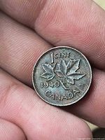Reverse side showing "1 CENT 1940 CANADA" with two maple leaves