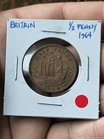 Front view of the 1964 UK half penny in 2x2 flip