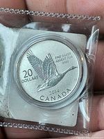 Reverse showing Canada goose, denomination and metal purity