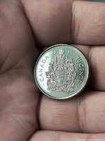Reverse view showing Canadian Coat of Arms and denomination 2021
