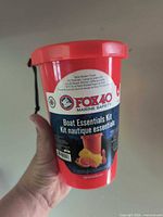 Front view of Fox 40 Marine Safety bailer bucket with label