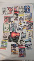Overview of scattered trading cards showing variety