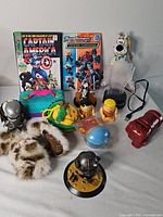 Group shot of entire lot showing comics, plush items, figures and accessories