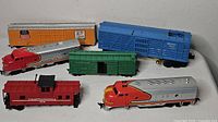 Group shot of six HO scale train pieces
