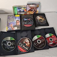 Group shot showing all seven game cases and discs