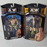 Front view of both sealed AEW figures Miro and Sammy Guevara