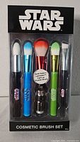 Front of sealed Star Wars cosmetic brush set showing five brushes