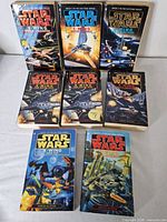 All eight Star Wars X-Wing paperbacks arranged; shows cover art and condition