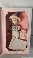 Hansel doll in closed display box front view