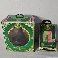 Both boxed Wicked charging accessories side-by-side