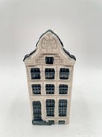 Front view of Delft Blue house bottle showing façade and number style