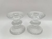 Front view of both textured glass candle holders