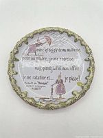 Front view of plate showing full design, verse text, green rim