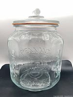 Front view of jar with lid and gasket in place showing embossing