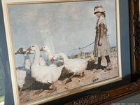 Front view of print showing girl with geese in ornate frame