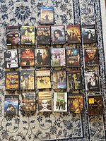 Full overhead view of all disc cases laid out on rug