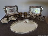 Full set laid out showing all 11 pieces including trays, sugar/creamer set, bowls with spoons, shell server
