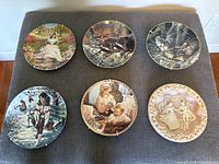 All six plates front view showing artwork and condition