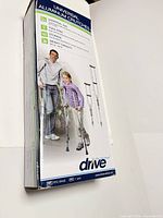 Retail box front showing Drive Medical Universal Aluminum Crutches branding and product image