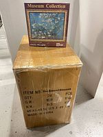Bulk carton with one puzzle box displayed