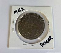Obverse side showing Queen Elizabeth II and date in holder
