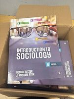 Cover of the textbook showing title, authors, edition