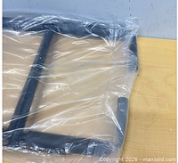 Hook set in clear plastic bag on table
