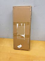 Sealed rectangular cardboard box containing cat lounge chair kit
