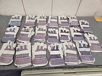 All twenty pairs of gloves laid out