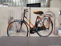 Both canvas prints side by side showing complete bicycle image