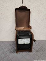 Meter in open case showing overall form