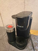 Front view of Keurig coffee maker and milk frother