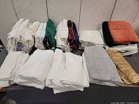 Bundled towels arranged on table, full lot overview