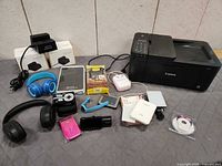 Group shot showing Canon printer and assorted electronics