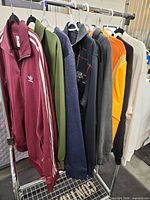 all seven garments on rolling rack