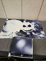 Folded duvet cover with Jack Skellington print and one sham displayed