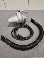 Shark Euro-ProX handheld vacuum with hose and nozzle