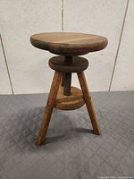 Full view of wooden artist stool