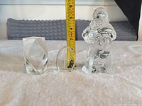 All three glass items adjacent to ruler for scale