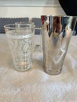 Cocktail recipe pint glass and stainless steel shaker tin