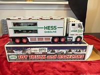 Side view of Hess truck on box showing branding and trailer windows