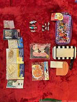 Overview of all items laid out on red surface