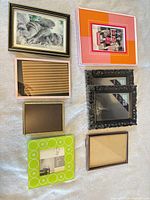 Assorted frames laid out showing eight of the eleven frames