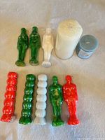 Group shot of all ten candles on surface